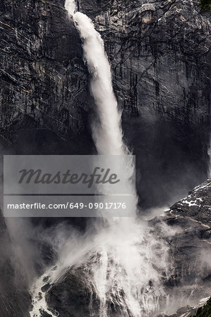 Waterfall flowing and splashing over rock face, Queulat National Park, Chile