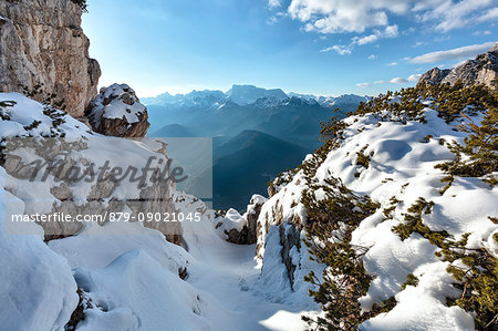Europe, Italy, Veneto, Belluno, Agordino, Dolomites, Palazza Alta. Snowy gully, in the background the Biois valley