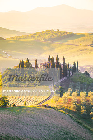 Podere Belvedere, the famous italian farmhouse, during sunrise. Val d'Orcia, Siena province, Tuscany, Italy