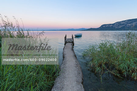 Angler jetty on Lake Garda (Lago di Garda) at dawn in Garda in Veneto, Italy