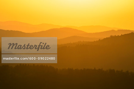 View from Lusen mountain over the Bavarian Forest at Waldhauser at sunset in the Bavarian Forest National Park, Bavaria, Germany View from Lusen mountain over the Bavarian Forest at Waldhauser at sunset in the Bavarian Forest National Park, Bavaria, Germany