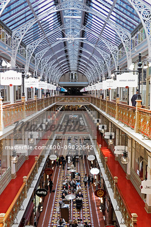 Overview of the Strand Arcade with glass vaulted ceiling and ornate brackets in Sydney, Australia