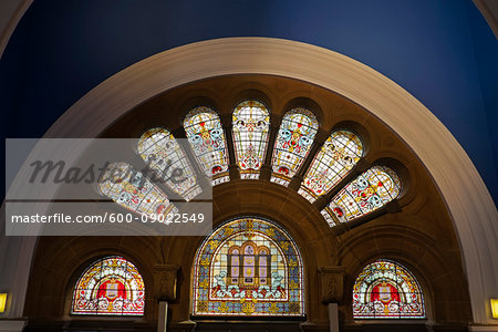 Arch with stained glass windows over the George Street entrance of the Queen Victoria Building in the Central Business District of Sydney, Australia