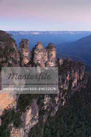 Three Sisters rock formation at sunset in the Blue Mountains National Park in New South Wales, Australia