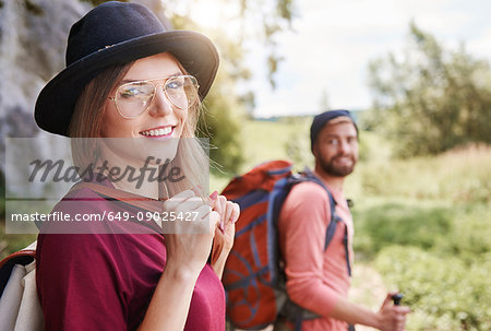 Portrait of woman hiking looking at camera smiling, Krakow, Malopolskie, Poland, Europe