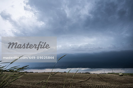 Layered supercell storm over and around wheat fields, Fairview, Oklahoma, USA