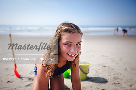 Girl playing on beach