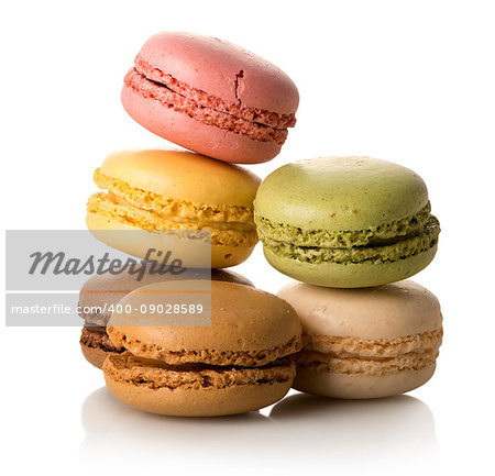 Heap of sweet french macarons isolated on a white background