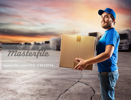 Courier ready to deliver packages with transport truck