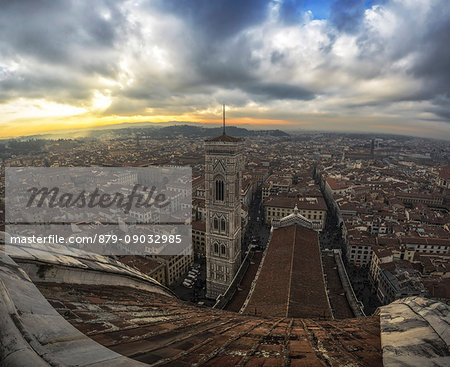 Florence, Tuscany, Italy. Sunset from the top of Cupola del Brunelleschi and Santa Maria del Fiore with Giotto tower.