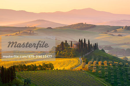 Europe. Italy. Tuscany. Siena District. Orcia Valley. Belvedere farmhouse at sunrise