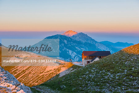 Italy, Abruzzo, Gran Sasso e Monti della Laga National Park, Sunset on Duca degli Abruzzi mountain hut