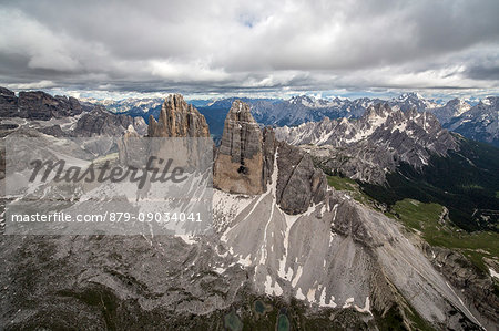 Aerial view of the Three Peaks of Lavaredo on a cloudy day. Dolomites. Cadore. Veneto. Italy. Europe