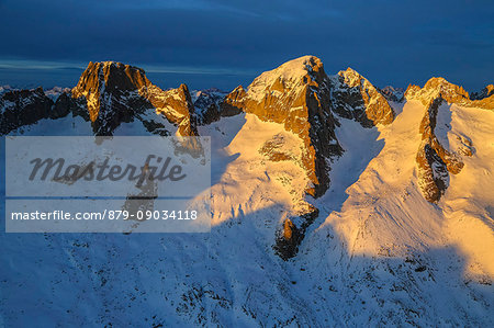 Aerial view of peak Badile and Cengalo at sunset Masino Valley Valtellina Lombardy Italy Europe