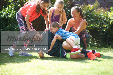 Family playing in garden