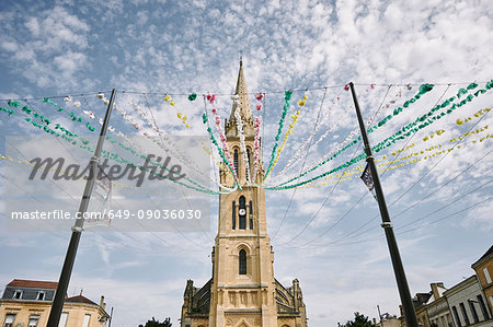 Low angle view of bunting from Eglise Notre-Dame bell tower, Bergerac, Aquitaine, France
