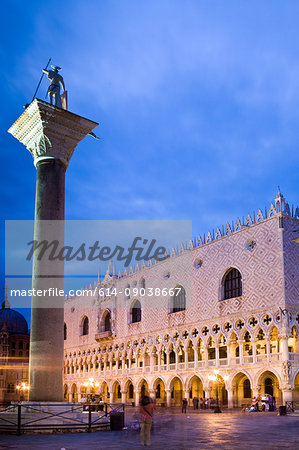 Statue on column by historic building, Venice, Veneto, Italy, Europe
