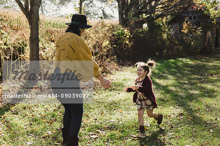 Girl running to mother, Oshawa, Canada, North America