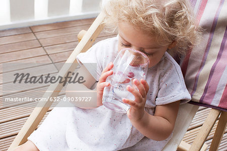 Little girl drinking water