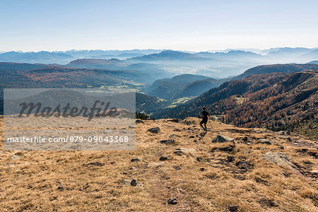 Italy, Trentino Alto Adige, Non valley, hiker on Luco Mount in autumn day.