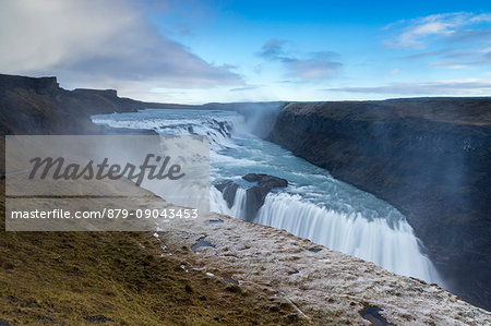 Landscape with waterfall and steam. Gullfoss, Southwest Iceland, Europe.