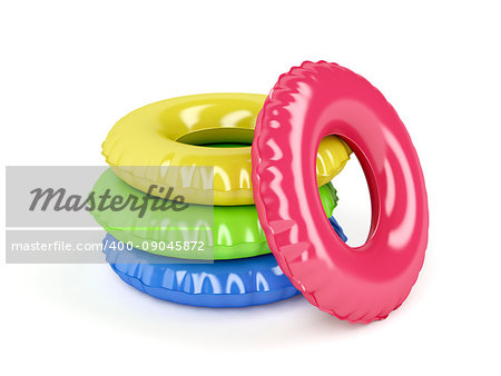 Group of swim rings with different colors on white background