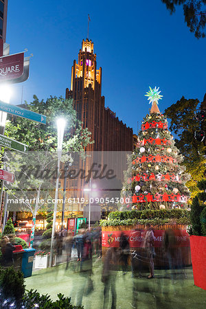 Christmas tree and decorations with Manchester Unity Building at City Square, Melbourne, Victoria, Australia, Pacific