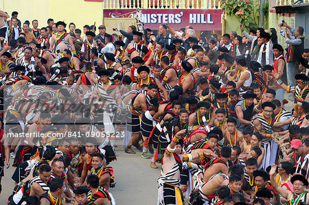 Naga tribesmen participating at the Stone pulling ceremony during Kisima Nagaland Hornbill festival, Kohima, Nagaland, India, Asia