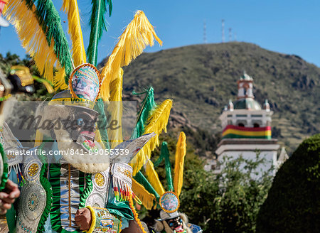 Masked dancer in traditional costume, Fiesta de la Virgen de la Candelaria, Copacabana, La Paz Department, Bolivia, South America