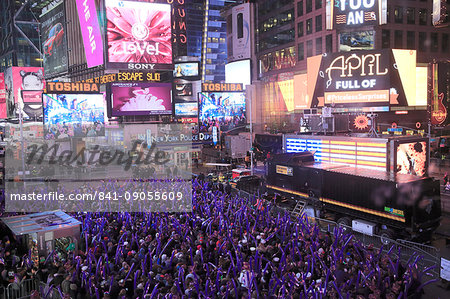 Crowds of revellers on New Years Eve, Times Square, Manhattan, New York City, New York, United States of America, North America