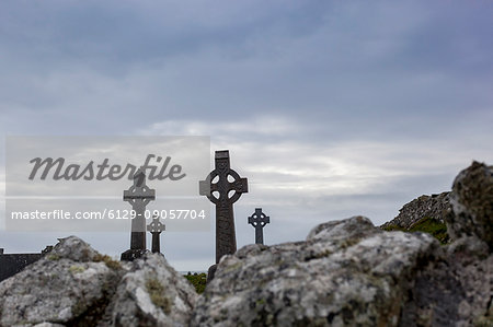 Celtic crosses in an abandoned graveyard in the County of Galway, Ireland, Europe.