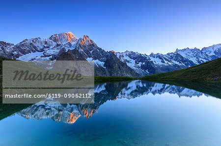 Mont Blanc reflected in Lac Checrouit (Checrouit Lake) at sunrise, Veny Valley, Courmayeur, Aosta Valley, Italy, Europe