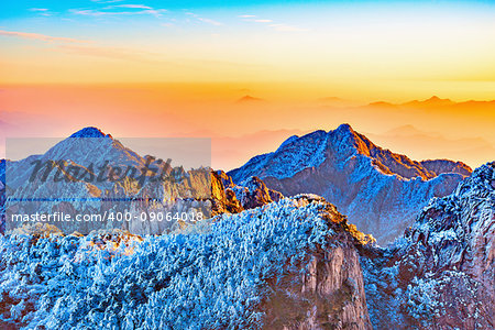 Sunrise above colorful peaks of Huangshan National park. China.