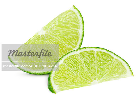 Two ripe slices of green lime citrus fruit isolated on white background with clipping path