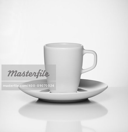 White espresso cup on white background