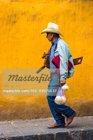 Close-up of a cowboy walking on street in San Miguel de Allende, Mexico