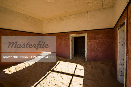 Sand in an old colonial house, old diamond ghost town, Kolmanskop (Coleman's Hill), near Luderitz, Namibia, Africa