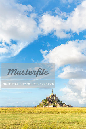 Clouds in the sky and grass in the foreground, Mont-Saint-Michel, UNESCO World Heritage Site, Normandy, France, Europe
