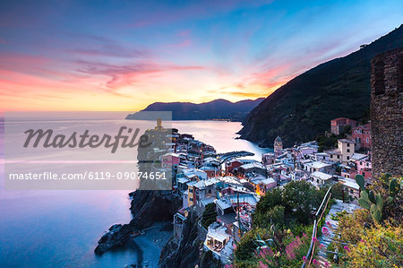 The remains of a stunning sunset over the old town and harbour of Vernazza, Cinque Terre, UNESCO World Heritage Site, Liguria, Italy, Europe
