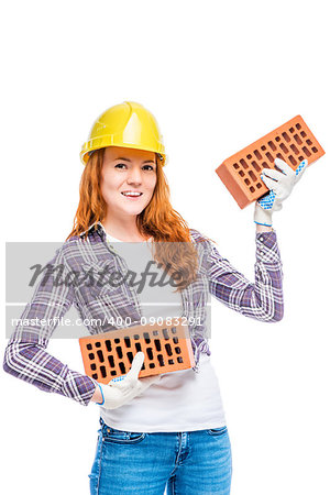 strong woman builder in yellow breeze with bricks on white background