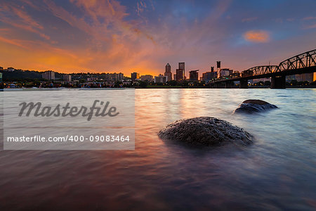 Portland Oregon downtown city skyline along Willamette River at Sunset