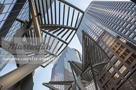 Sculpture and urban office buildings on Stephen Avenue Walk, Downtown, Calgary, Alberta, Canada, North America