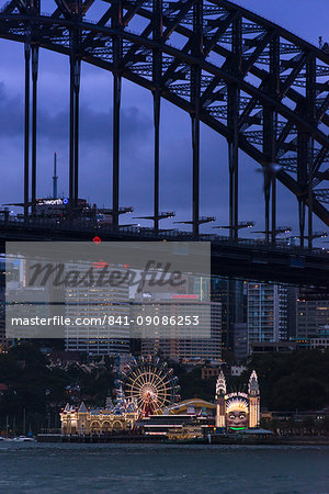 Sydney Harbour Bridge with Luna Park amusement park on North shore, Sydney, New South Wales, Australia, Pacific