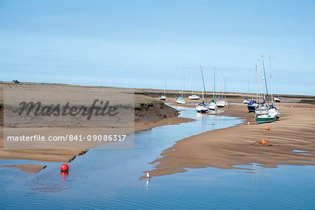 View of the harbour at low tide, morning, Wells-next-the-Sea, North Norfolk, England, United Kingdom, Europe