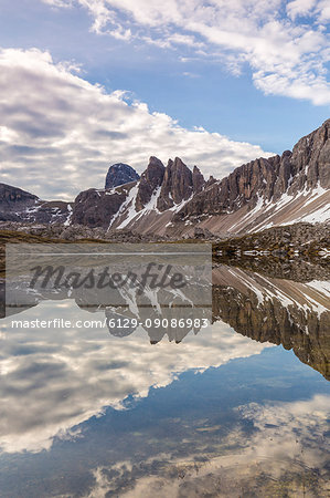 Rocky peaks reflected in Laghi Dei Piani, Dolomites, South Tyrol, province of Bolzano, Italy