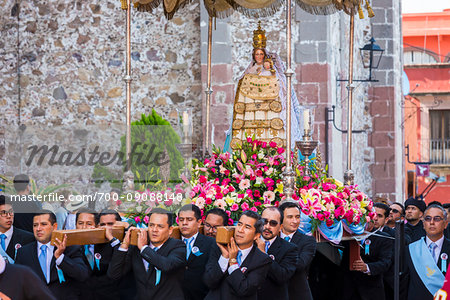 Men carrying statue of the Virgin of Loreto during the procession of Our Lady of Loreto Festival, San Miguel de Allende, Mexico