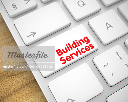 White Keyboard Key Showing the TextBuilding Services. Message on Keyboard White Keypad. Online Service Concept: Building Services on Slim Aluminum Keyboard lying on the Wood Background. 3D Render.