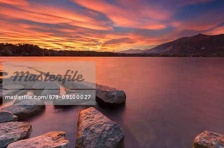 Incredible sunset of lenticular clouds on Lake Annone, Annone di brianza, Lecco province, Brianza, Lombardy, Italy, Europe
