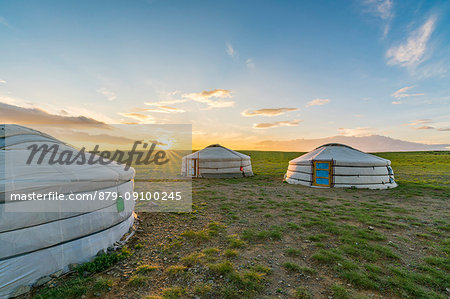 Mongolian nomadic traditional gers while the sun sets. Middle Gobi province, Mongolia.