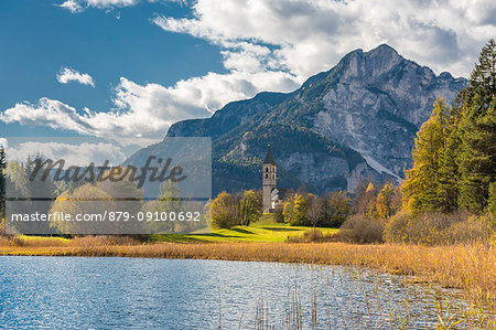 Favogna / Unterfennberg, Magrè / Margreid, province of Bolzano, South Tyrol, Italy, Europe. The lake Favogna and the church "Mary Help of Christians"